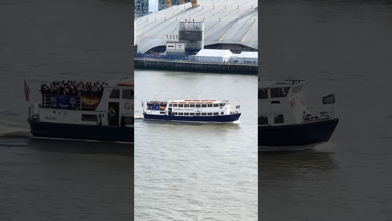 Beautiful ship/boat sailing away on river Thames 