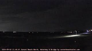 Preview of stream Sunset Beach Waterway & Bridge Webcam by sunsetbeachsales.com