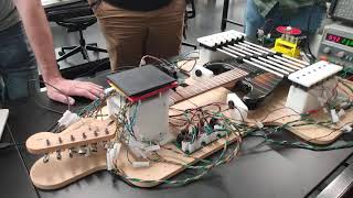 Robot that plays guitar