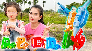 Cam Cam reivew hộp chữ cái biến hình khủng long lắp ghép được thành robot - Cam Cam TV