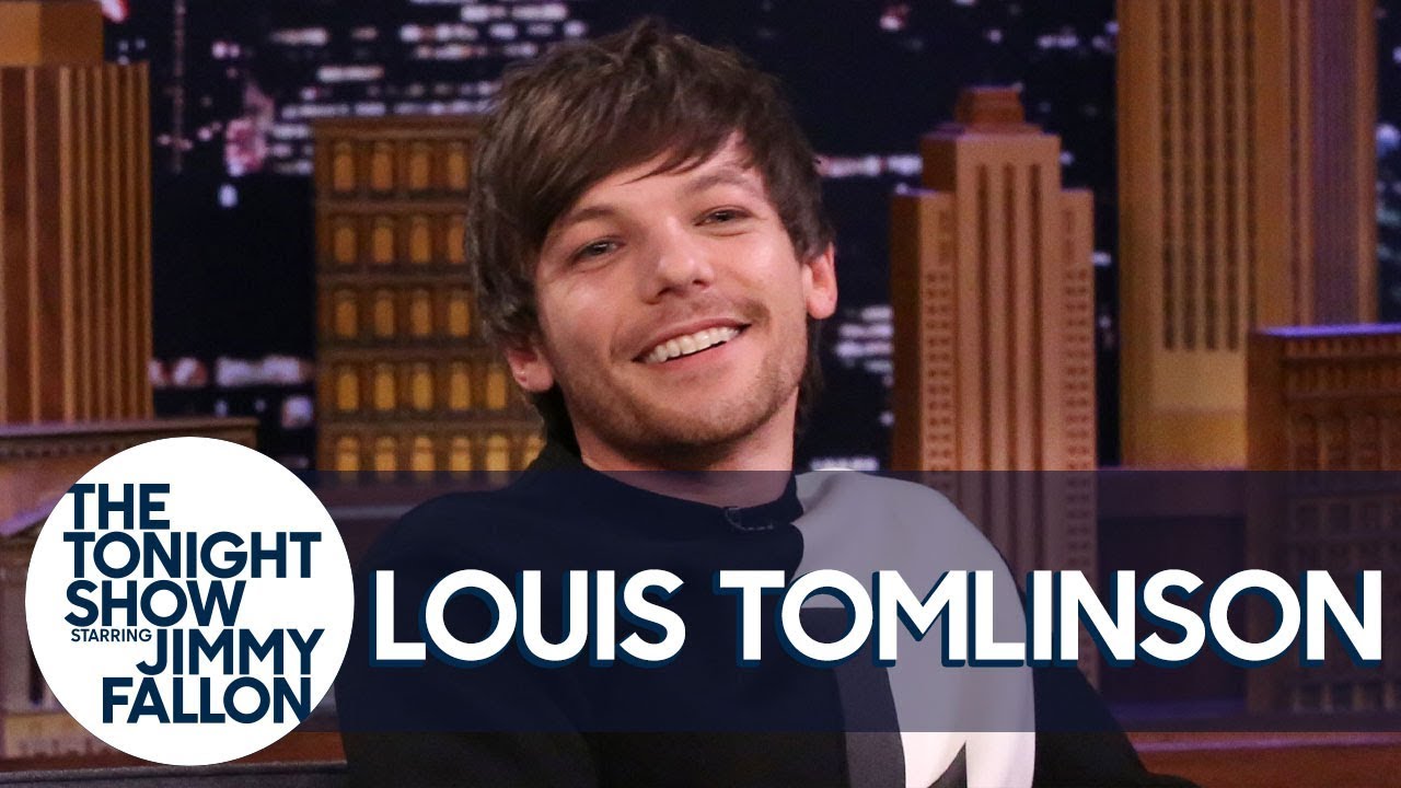 Louis Tomlinson Reacts to Home Footage of Himself Starring as Danny Zuko in Grease