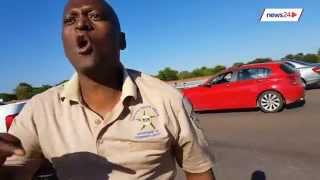 WATCH: Gauteng cop shoves motorist during roadside altercation