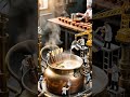 Whimsical World of Chai: Watch Tiny Chefs Brew Spiced Tea in a Giant Copper Pot