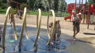 Colin splashing at the park