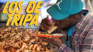 Haitiano come tacos de tripa y le encantan