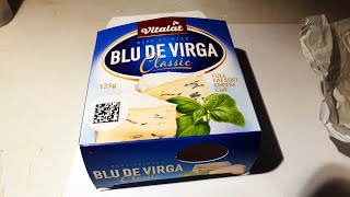 Cheese with blue and white mold under a microscope