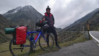 Crossing the Snowy Swiss Alps on a Bicycle