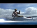 Outrigger surfing in tahiti