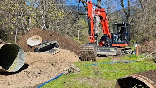 Pond overflow pipe replacement with the new Kubota KX 080 4