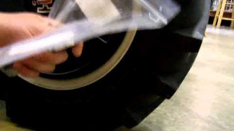 Putting on wheel weights on cub cadet 128 (1286A)