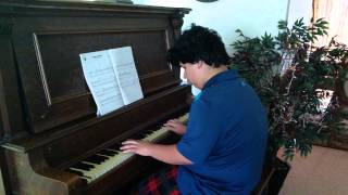 Lorenzo Riley self teaching the piano