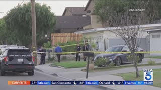 Man arrested after body found in Costa Mesa backyard