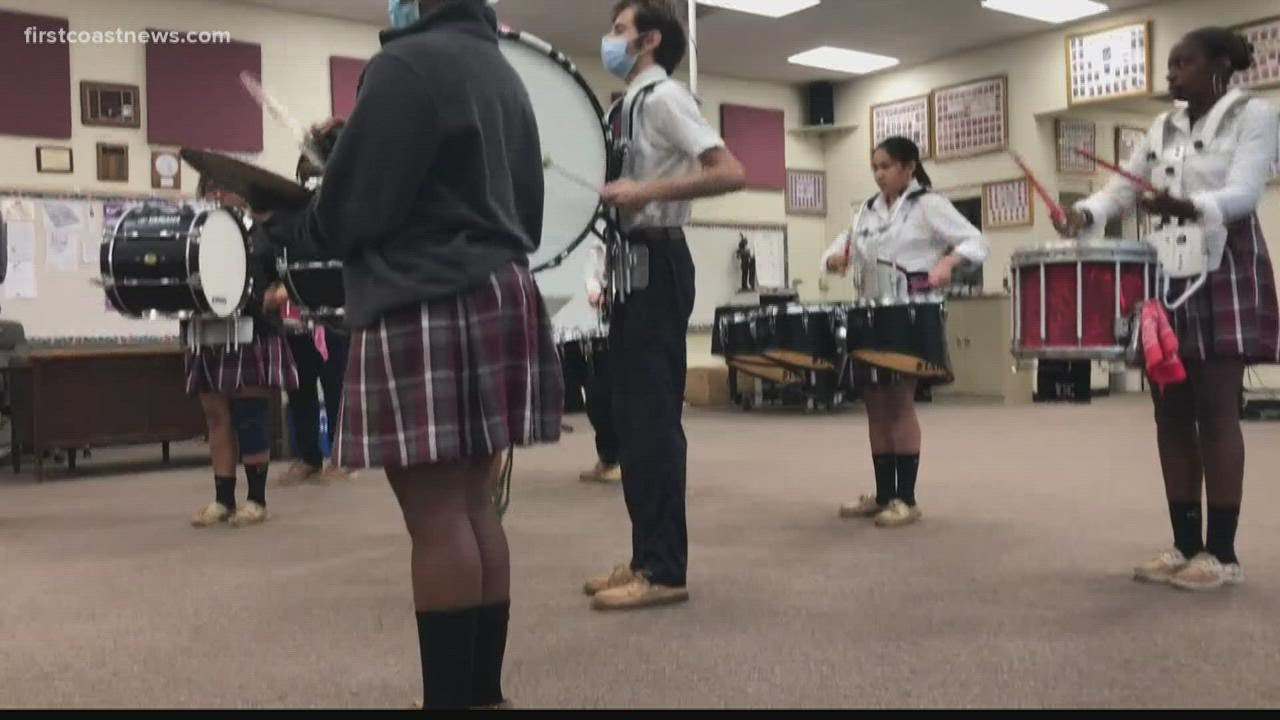 Local drum line performing at Jumbo Shrimp home opener street festival