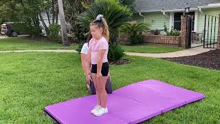 Girl does attempts backflip with mom's help and faceplants on gymnastics mat