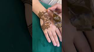 #unique flower design#back hand design.... DM for this mehndi design contact number 799 7645164