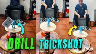 Play Card Trickshot Into a Clothespin Attached to a Wooden Circle on a Drill