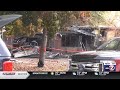 Fire that killed twins blamed on gas containers