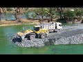 Wheeloader SDLG ,Heavy Dump Trucks Power Machinery Filling Pond to make more land for Development