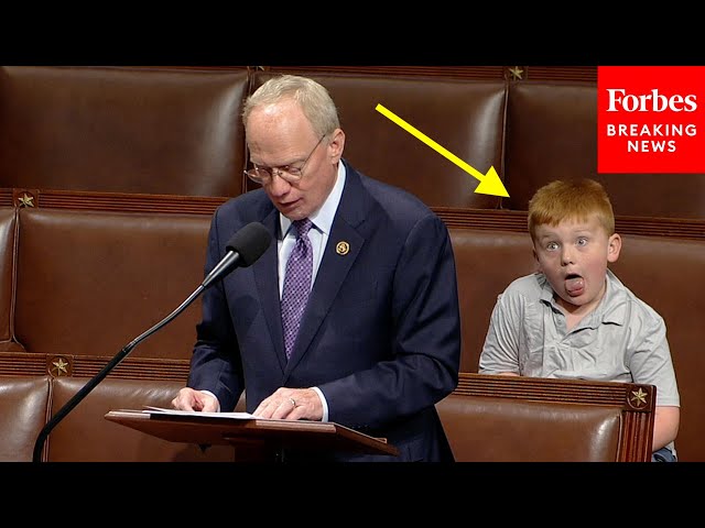 VIRAL MOMENT: John Rose’s Son Steals The Show Making Funny Faces Behind Dad’s House Floor Speech class=