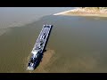 Low water at confluence of the missouri  mississippi river with two towboats