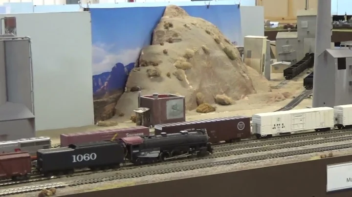 Frisco passing Monolith Cement Plant module. While...