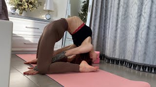 Flexible contortion girl. Workout for back flexibility. Gymnastic exercises posterior flexible fold