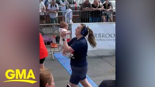 This runner carried her baby over the finish line of a 10K