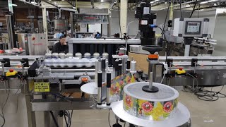 Wraparound Labeling on Beer Cans - TechLine Vertical Roller System
