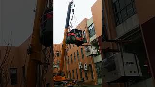 The Process Of Lifting Heavy Equipment From The Building- Good Tools And Machinery Make Work Easy