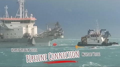 Hopper Dredger Vessel Doing Pipeline Connection