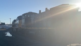 CSX M560-10 with Freshly Painted ES40DC and MP15AC Trailing