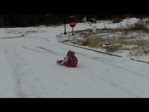 Carlee and Elizabeth Sledding down Mt. Crumpit