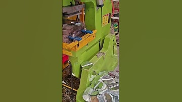 This machine can drill holes in iron plates to make them easy to install. #automobile