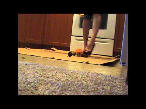 high heels crushing tonka toys slow motion