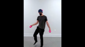 Juggler Juggles Balls Behind His Neck - 1295131
