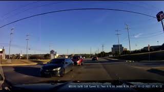 Idiot drives into wrong lane to turn.