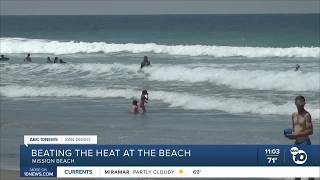 Hot temperatures bring crowds to Mission Beach businesses