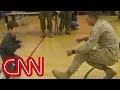 A boy with cerebral palsy walks to his Marine dad for the first time