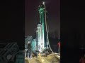 RC drilling rig's mechanical arm capable of automatically adding drill rods.