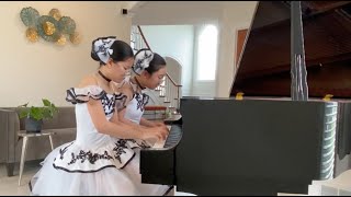 RMA Students Jessica Park and Reilin Lyu Performing Siberian Sleighride By T. Brown