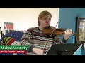 Michael Westerby, a high school violinist gives a Christmas concert at G.I. Public Library Monday