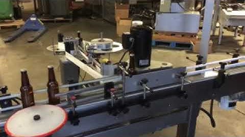 BID ON EQUIPMENT: Item 347678 - QUADREL VERSA-1000 Wrap Around Labeler with Conveyor