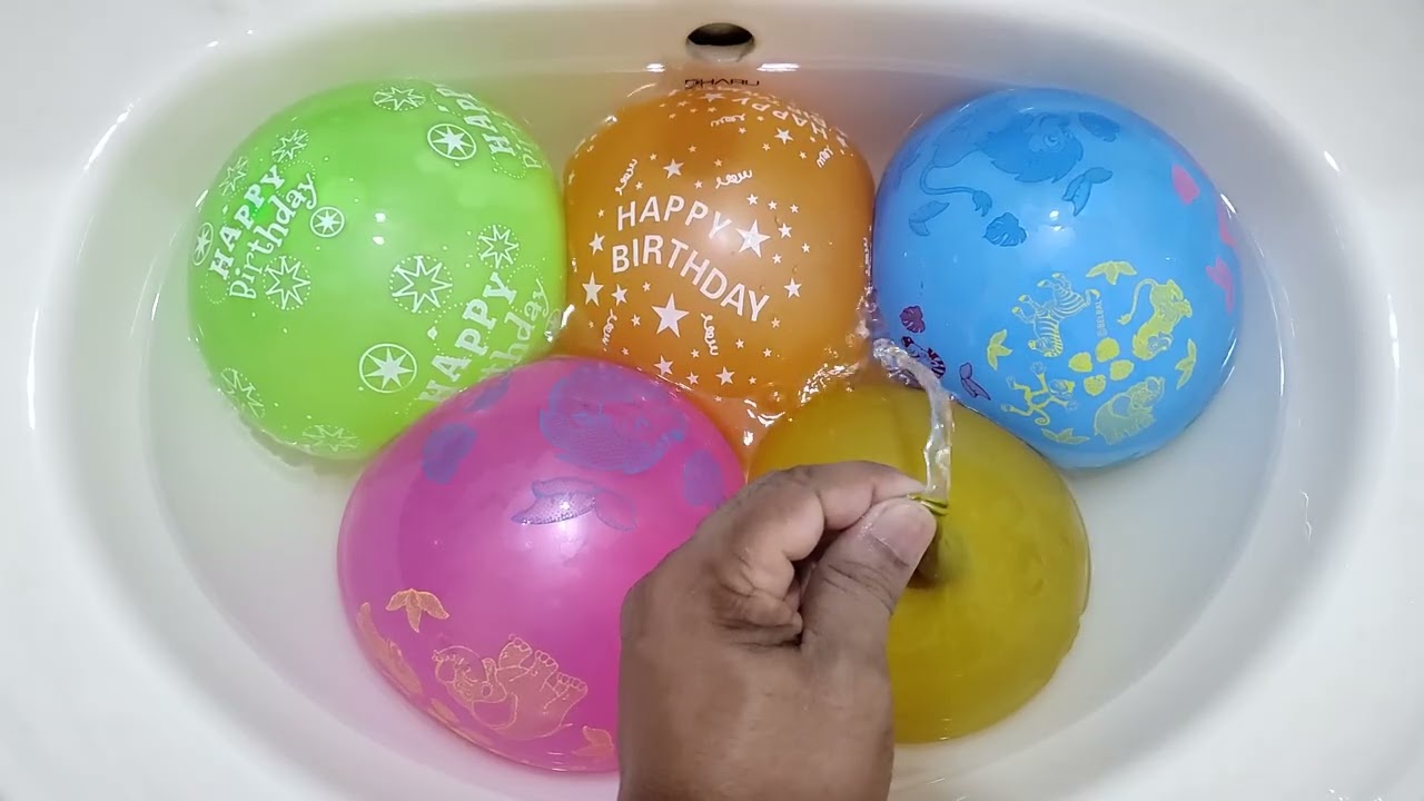 satisfying colourful water balloons popping 