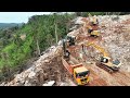 Fullss processing connecting high road on mountain use excavator bulldozer and dump truck