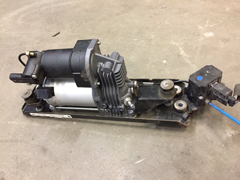 Luchtvering compressor bmw e61 verwijderen