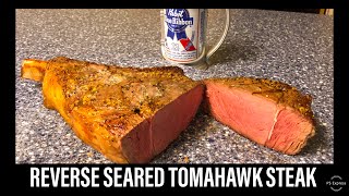 Reverse seared ribeye tomahawk steak on kamado style grill / bge,
akorn, joe, big steel keg