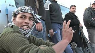 Libya rebels push for control of besieged city