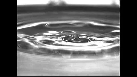 Droplet Impact on a thin surfactant film (15cm)
