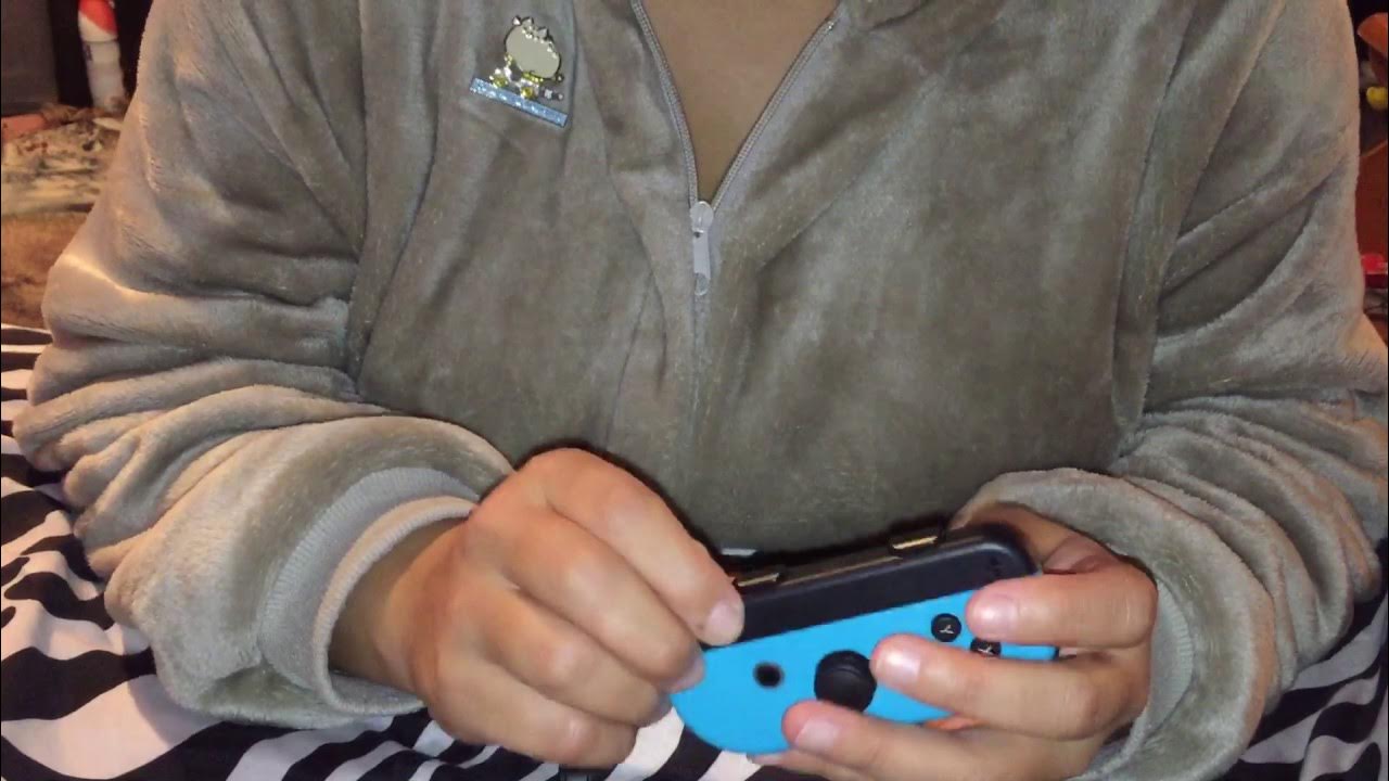 How to get your joy con wrist strap unstuck from upside down position