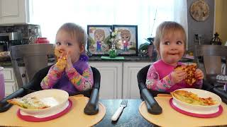 Twins try pickle pizza and pepperoni pizza